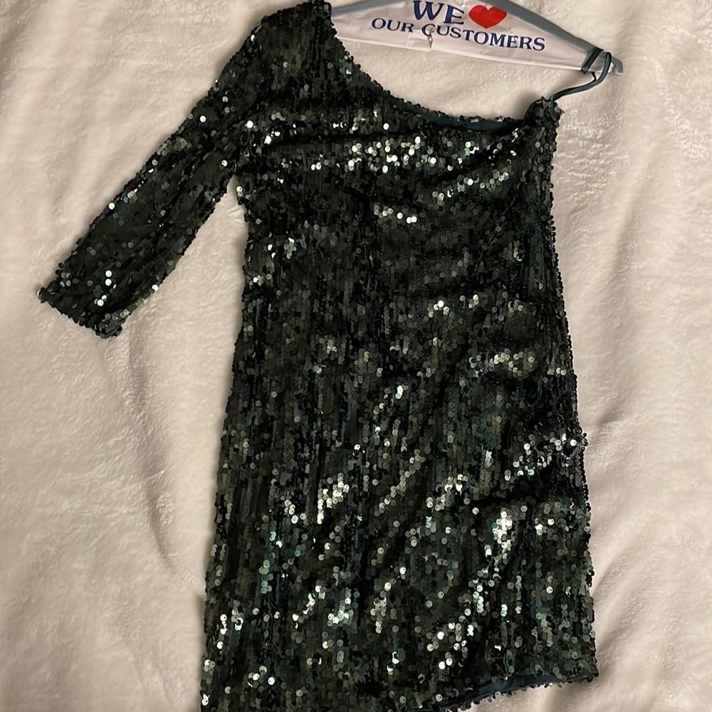 Dark green sequin dress.